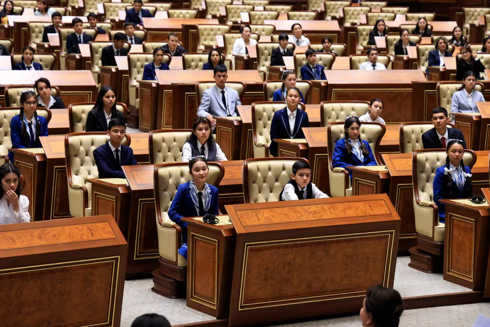 Young people filling the Senate chamber.