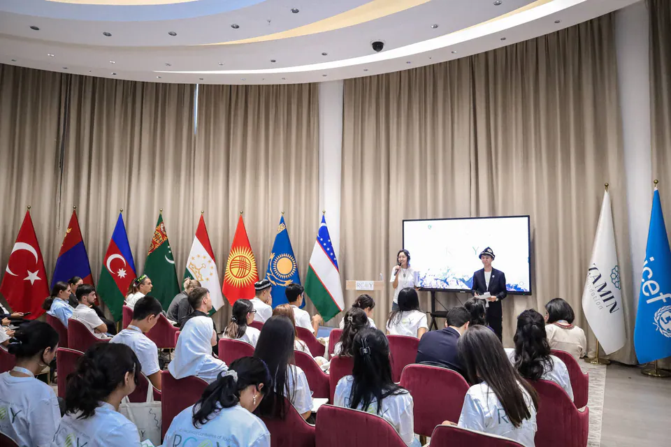 Delegates from nine countries in the conference hall.