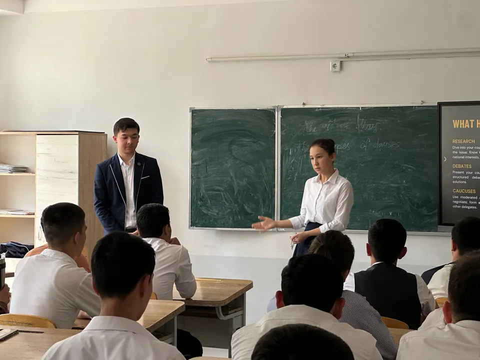 Team members leading a classroom session.