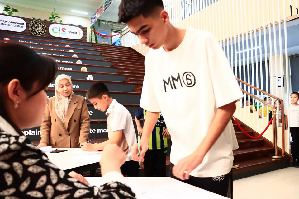 Students casting their votes.