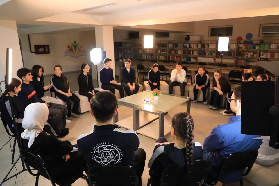 Visiting other schools to build connections.