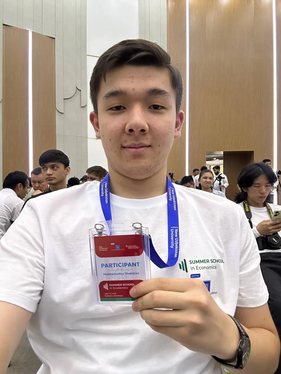 Day one, participant badge on.
